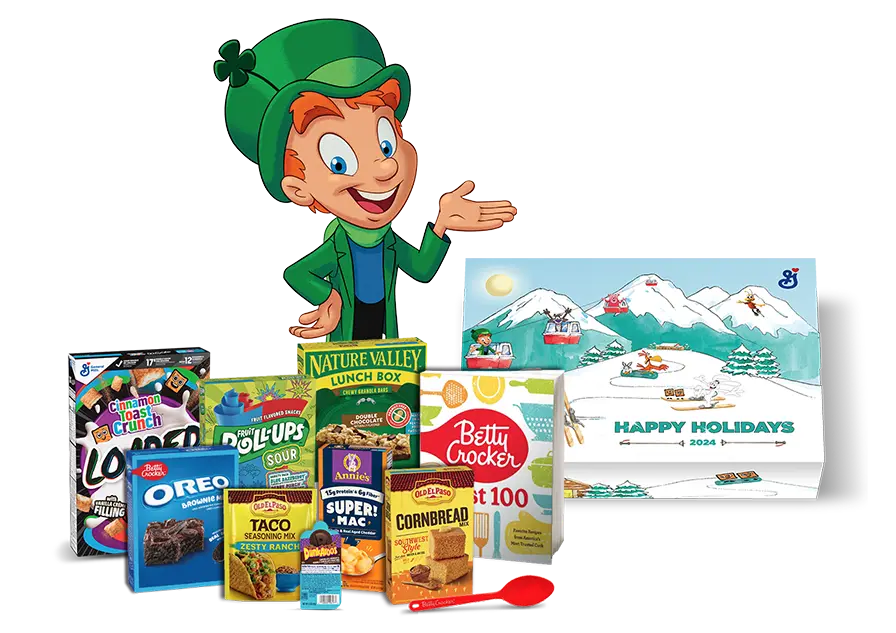 Lucky the Leprechaun next to a bundle of General Mills products , a Betty Crocker Cookbook, and the Holiday Gift Box.